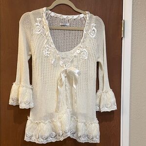 Elegant Cream Knit Top with Floral Details